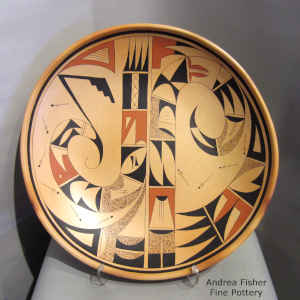 Click to see a larger version Bird element, geometric design and fire clouds on a polychrome platter