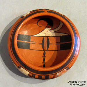 Click to see a larger version Bird element and geometric design inside and out on a polychrome red ware bowl