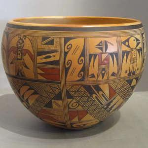 Click for a larger version Red and black shard designs on a yellow ware bowl