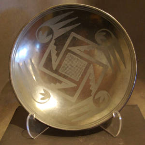 Click to see a larger version Bird wing and geometric design on a black on black bowl